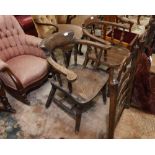 A 19th century elm captains chair