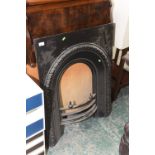 A cast iron fire surround