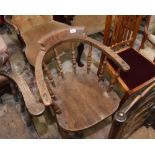 A 19th century elm captains chair