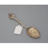 A Scottish silver spoon by Henry Tatton the heavily chased bowl with the Edinburgh coat of arms, the