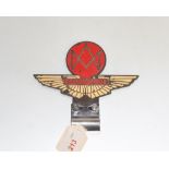 An Aston Martin Owners Club enamel car badge.