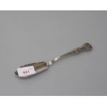 A Victorian silver butter knife, London 1862, Kings Pattern, the blade engraved with a crest