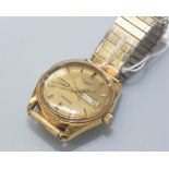 Longines Admiral Automatic man`s wristwatch, gilt dial, baton numerals, centre seconds. day and date