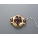 A Victorian pink tourmaline seed pearl and enamel brooch, in the Etruscan taste, mounted in yellow