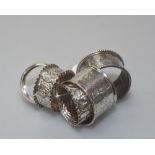 A group of Victorian and later silver napkin rings including Birmingham 1899, Sheffield 1911 etc. (