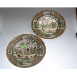 A pair of Canton famille rose plates, decorated with cockerels.