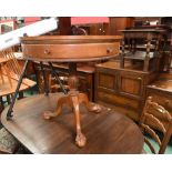 A period style mahogany tripod drum table, the single drawer opposed by dummies