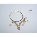 A group of 9ct gold jewellery inc. bangle, gate link bracelet, wishbone ring and Claddagh ring (