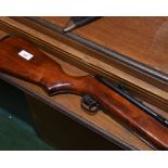 An air rifle with side lever action .22 cal