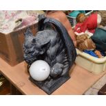 A gargoyle form table lamp