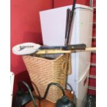 A wicker laundry basket and contents