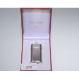 A cased Cartier cigarette lighter