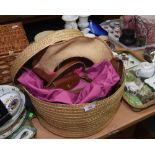 A basket containing hats and bags