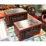 A pair of graduated chinoisserie boxes