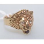A 10ct gold signet ring in the form of a lions head set with coloured stones, 6.6 grams