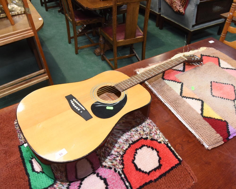 A tanglewood acoustic guitar