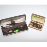 A boxed Papermate biro and cufflinks, together with a Damart biro and small gold plated propelling