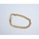 A 9ct gold curb link bracelet, 40 grams