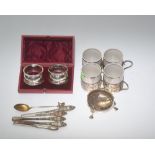 A pair of cased silver napkin rings, a George III silver salt and a set of four silver plate mounted