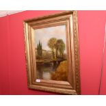 Late 19th Century British School, man in punt on a river, oil on canvas, framed in gilt frame