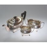 A 20th century silver bachelor teaset in the Regency style comprising teapot, cream and sugar,