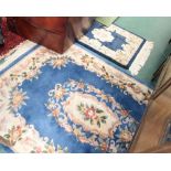 Two Chinese rugs with blue grounds