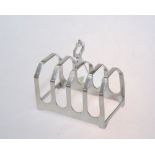 A silver four division toast rack marked for Sheffield 1932