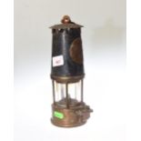 A miner's lamp, type SL, no. 208 marked Eccles,