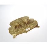A French Art Nouveau brass desk standish with twin ink wells and cast with stylised flowers, circa
