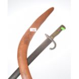 An Aboriginal boomerang and a WW1 military bayonet and scabbard (possibly Belgian) (2)