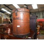 A vintage tin flour bin