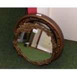 A Regency mirror, the circular convex mirror in a conforming frame, tog. with a gilt framed mirror