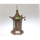A Chinese tin Pagoda prayer wheel,