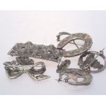 A group of four marcasite brooches and pair of clip earrings, two Edwardian silver brooches (qty)