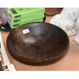 A 19th Century turned wooden bowl, poss. lignum vitae