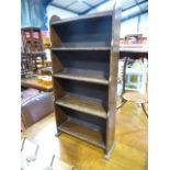 A small oak waterfall bookcase