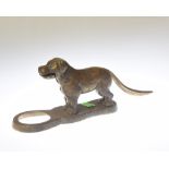 A brass nut cracker in the form of a dog