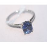 A ceylon sapphire ring with diamond shoulders on a 18ct white gold band. Sapphire 2.27ct. Ring