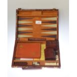 A leather bound backgammon set together with two shakers, dice, and a State Express 777 tin