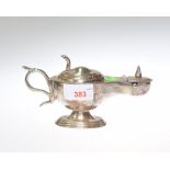 A Dunhill chrome table lighter in the form of a Genie lamp,