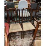 A pair of 19th century oak dining chairs