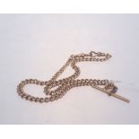A 9ct gold watch chain with T bar, 34.5g