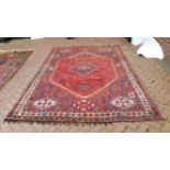 A vintage Persian Quashqai carpet. 317 x 207