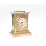 A brass cased mantel clock, circa 1900, the dial with Roman numerals and two subsidiary dials