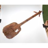 A stringed musical instrument poss. Western Sudan with carved tuning pegs.