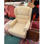 A George III style wing chair