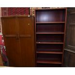 A 1950s oak wardrobe; tog. with an open bookcase