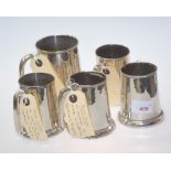 A group of five African silver tankards, cast for the Kaduna Motor Club and inscribed, unmarked