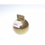 A brass Orb lighter