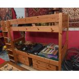 A Stompa pine bunk bed; tog. with a pair of pine two drawer chest